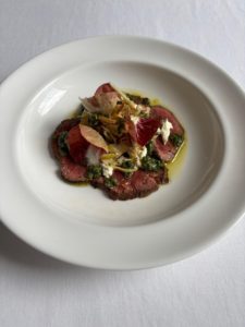 Carpaccio of Ethical Butcher beef with raw artichokes, salsa verde and horseradish cream